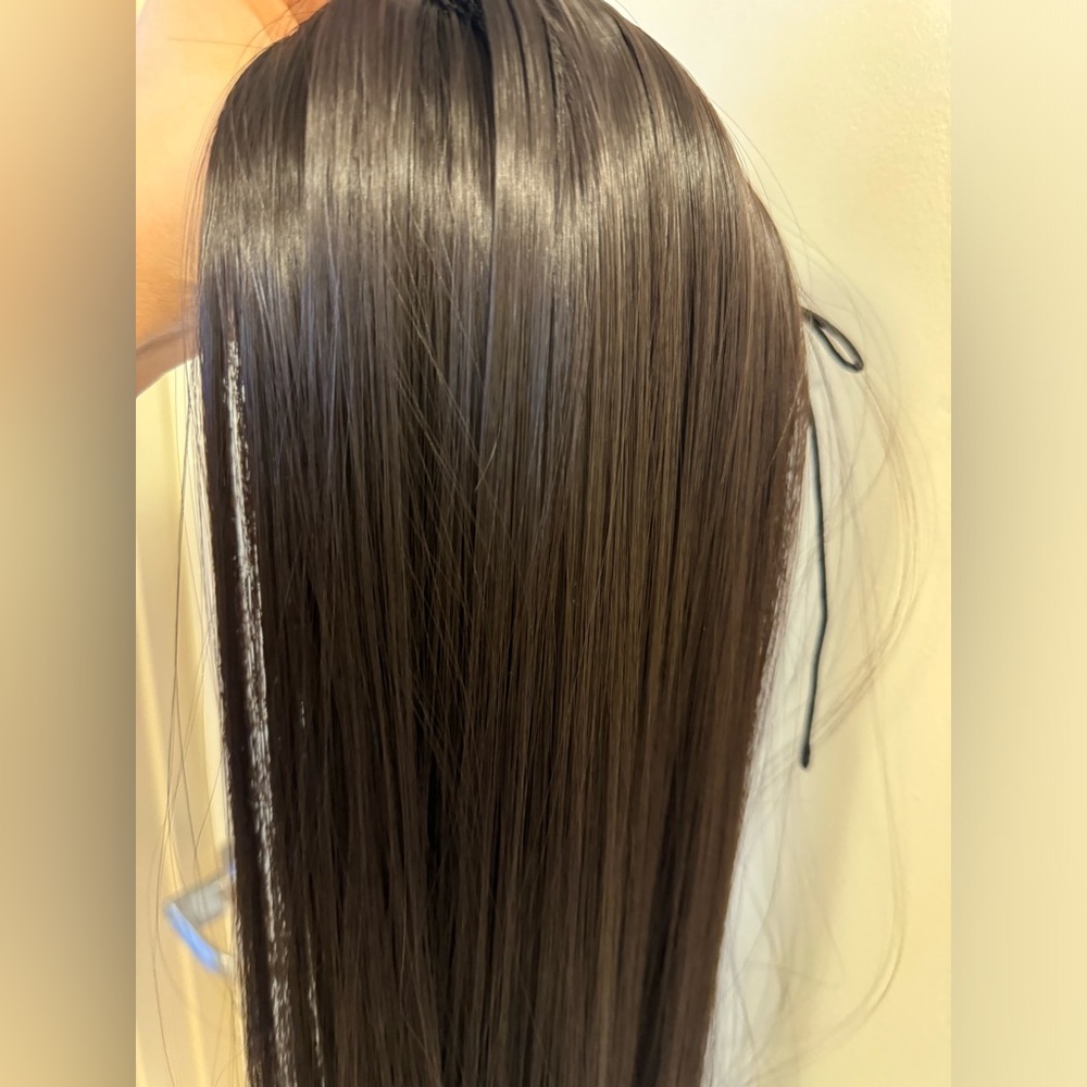 Dark brown claw synthetic hair extensions